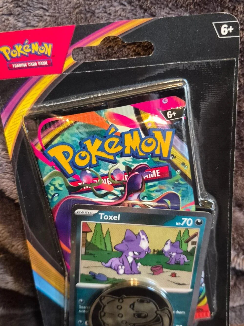 Pokémon TCG Mega Evolution—Chaos Rising 1 Booster Pack Toxel Promo Card & Coin